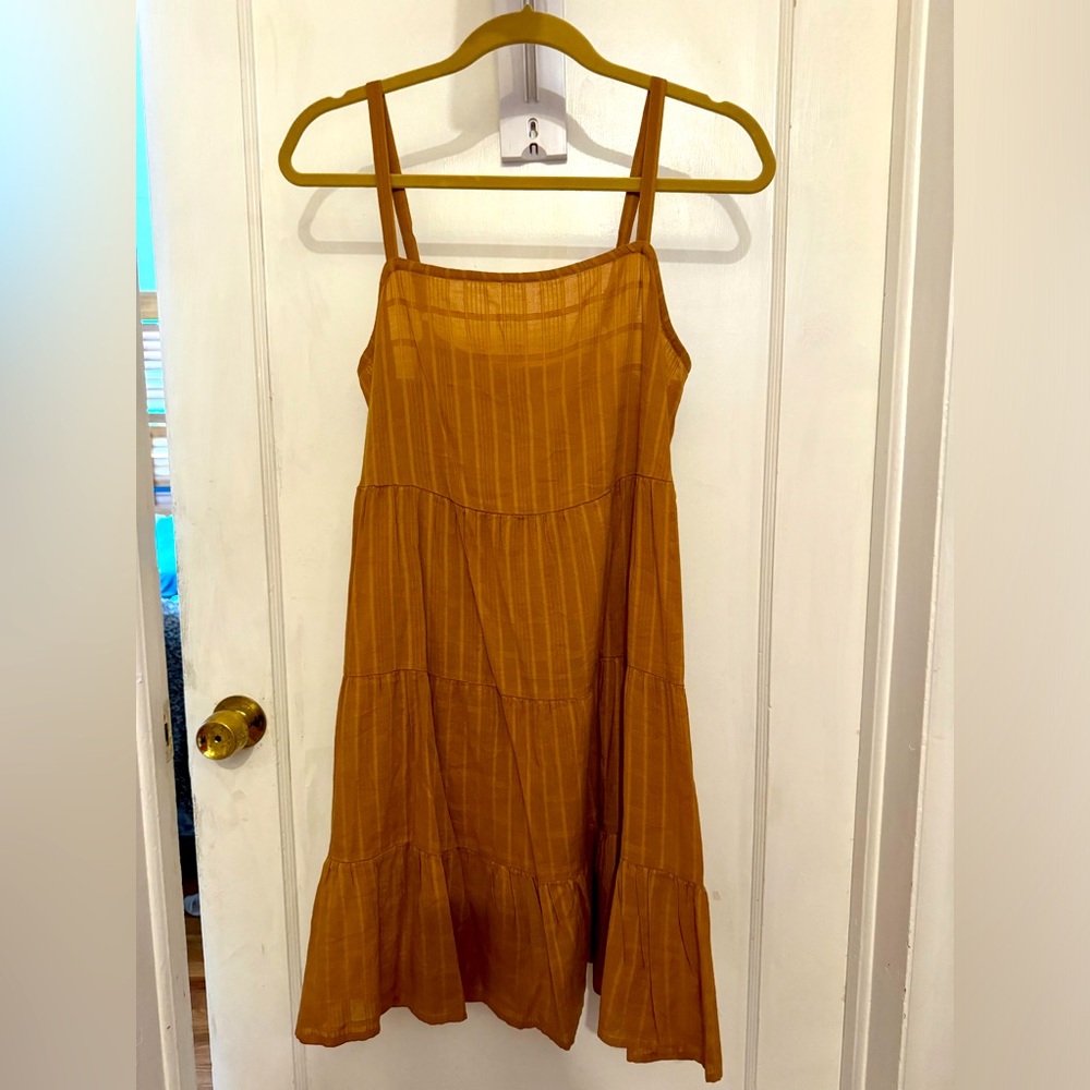Cute, airy mini dress. Camel color. Thin strap.
